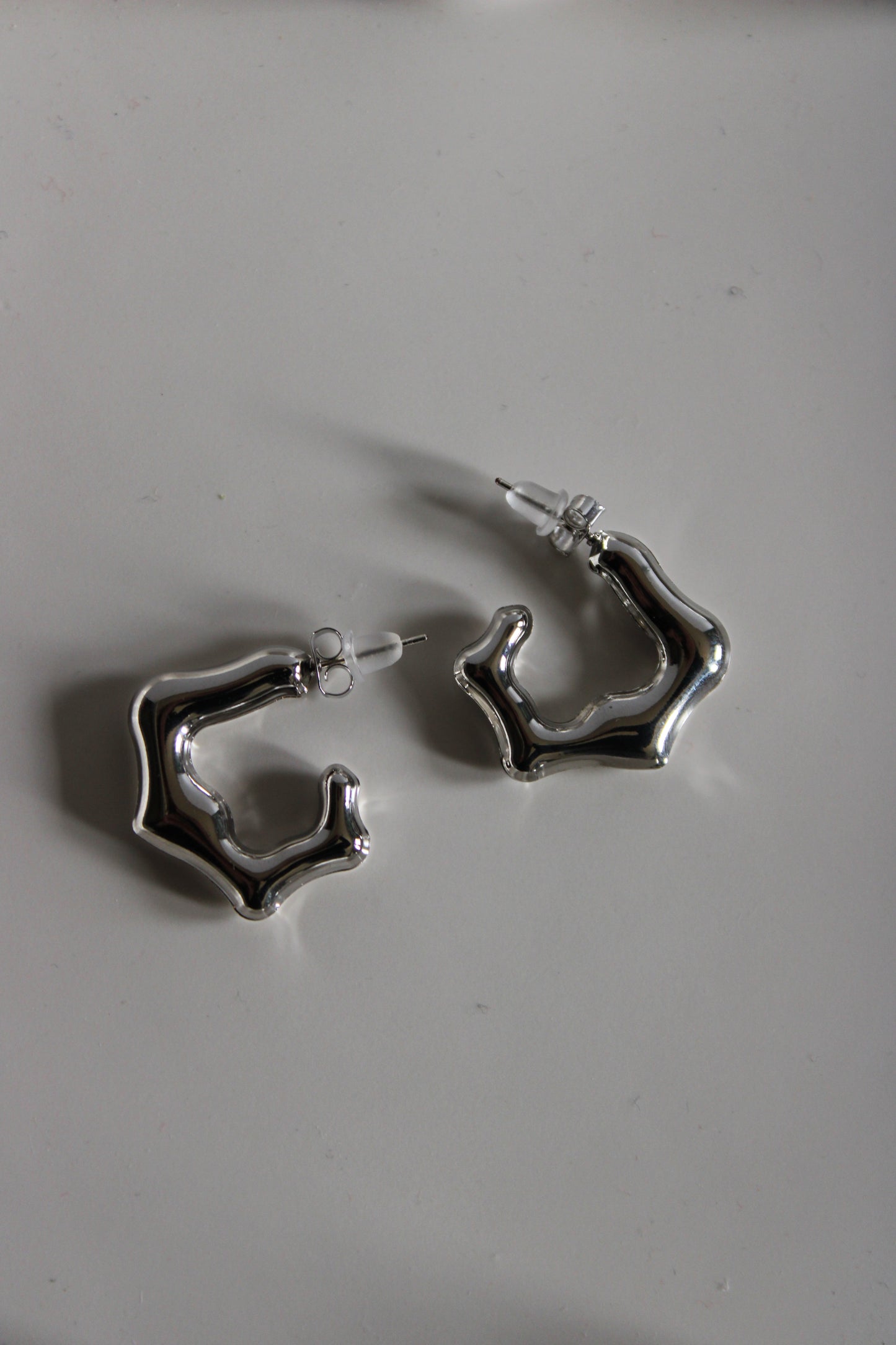 silver earings wavy look