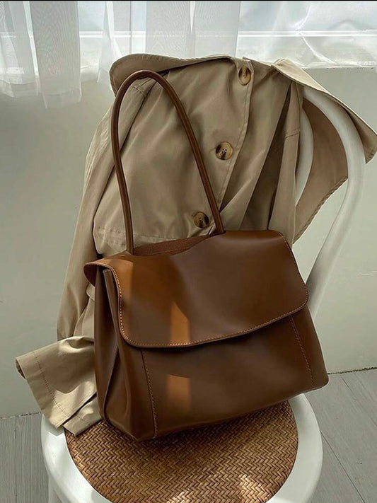 brown hand bag