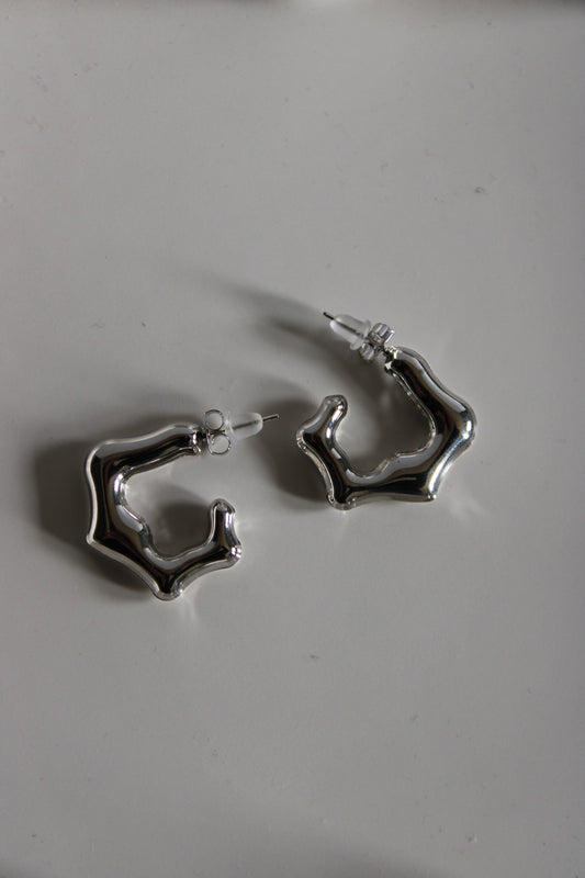 silver earings wavy look